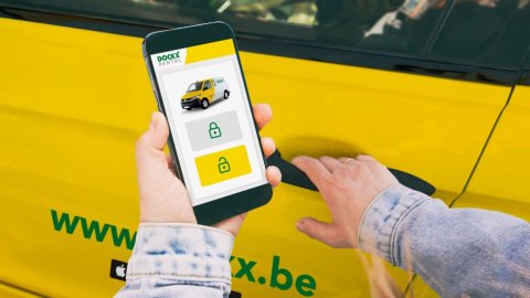 Woman opens vehicle with Dockx app